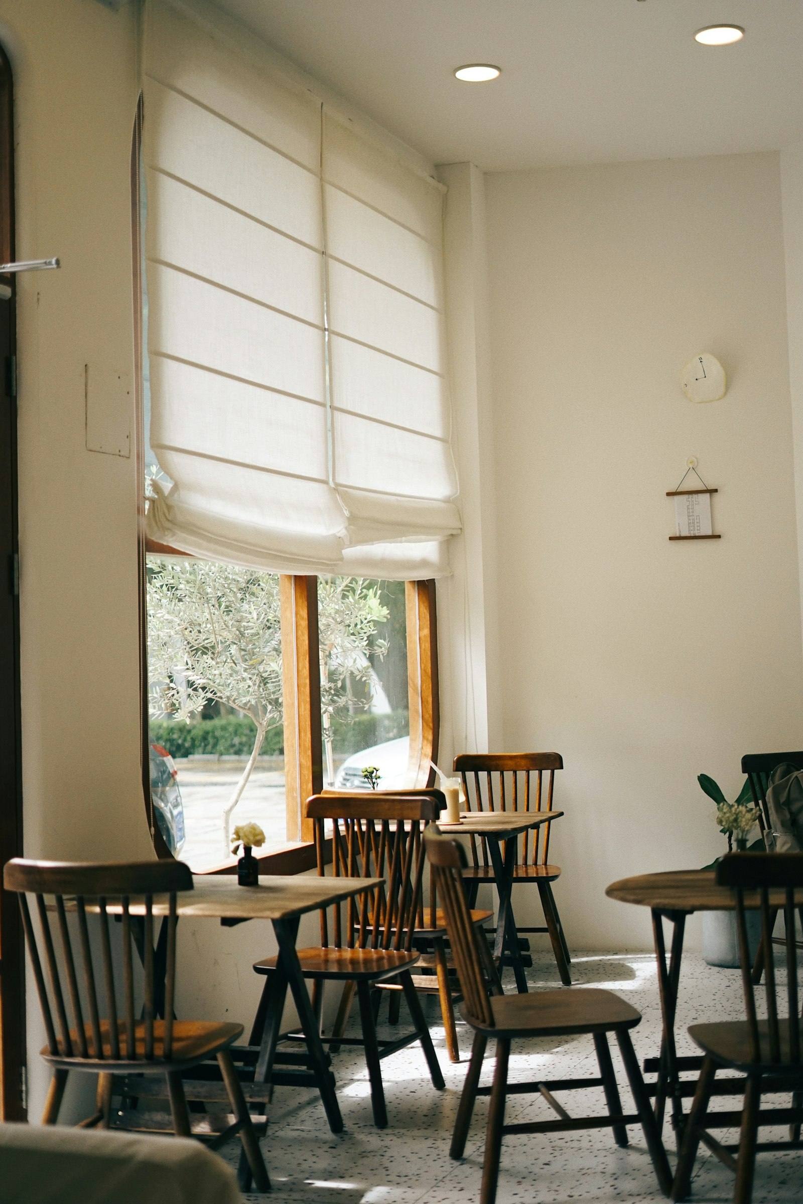 Warm light falling across the empty morning cafe